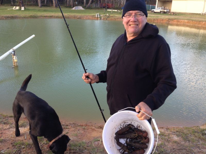 Fisherman with marron and rod